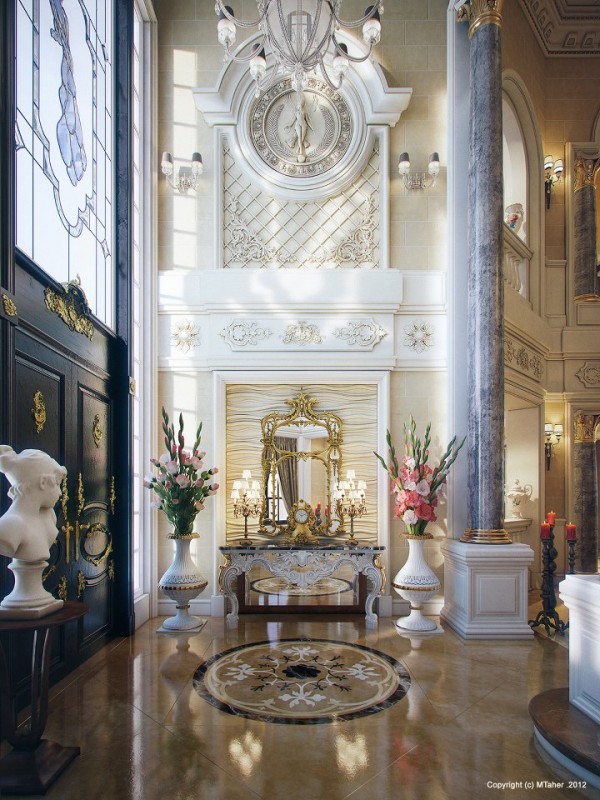 The Villa's breathtaking entry is opulent beyond words with its soaring ceilings, decorative wall friezes, marble columns and gold accented finishes.