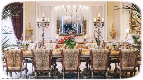 The Villa's main dining room boasts an ornately carved and finished dining table surrounded by 12 plushly upholstered dining chairs covered in velvet.