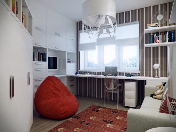 Stripes are always a classic choice for boy's bedrooms, but this one has a modern twist. The built-ins fill the space with plenty of work surfaces, storage and display.