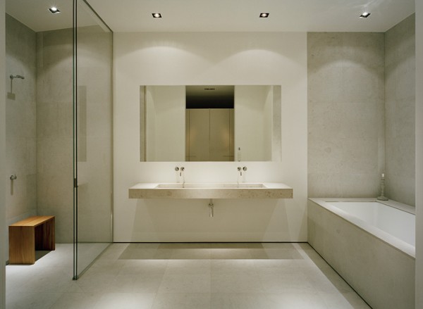 The master bathroom is a testament to the beauty of minimalist design with texture and light leading its decor.