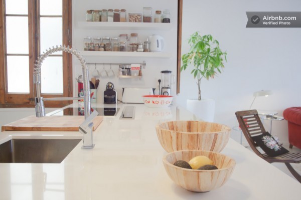 Counter tops are kept light to be unobtrusive to the overall lightness of the open living space.