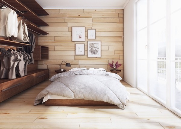 The back wall of this natural style bedroom mimics the flooring for a mirrored effect. An open closet adds interest to the space.