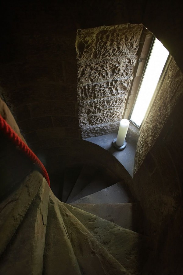 The tower's original stairwell captures the darkside of the tower not seen in its other contemporary additions.