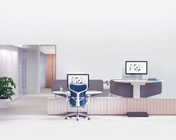This double work station is part of the 'Locale' collection from Herman Miller. The side by side desks offer quick collaboration between team members while insuring each has the option to work standing or sitting.
