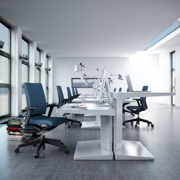 As shown here, the 'Alpha' desk frees up the perimeter of the work space and offers each opposing user the option to sit or stand.
