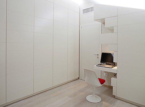 A small built-in desk makes a perfect mini-office in the master bedroom.