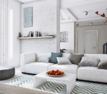 This space, like the previous bachelor's apartment, is all about neutrals paired with textures. This apartment uses a much softer neutral palette, with plenty of light teals, grays, white, and pops of warmer tones, as seen in the living space above. Textures abound through the use of a variety of fabrics and the chevron rug is a look that is both striking and simple.