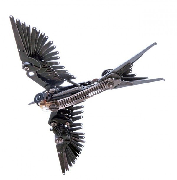 While assembling his set of beautiful swallows, Mayers discovered he could make their wings partially retract giving the appearance of being in flight.