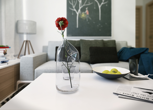 Sometimes its the little details that make or break a room's decor. Here a single red carnation and bowl of limes adds a lively element of color and nature to the otherwise neutral space.