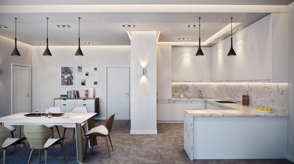 The kitchen area is simple and smaller but it doesn't take away from the grandeur of this design. The built in ovens allow for more cabinet and counter space. The dining room has floor to ceiling mirrors giving the illusion of a deeper space. The clean white color palette with neutral color touches contribute to the open feel of the room.