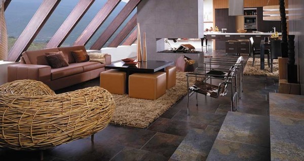 These stone floor tiles reflect so many different colors and add personality to this living room. The tiles are relatively dark but with so many colors found within them, it doesn't make the room appear too dark.