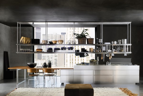 Very organized, functional kitchen using overhead stainless steel racks.
