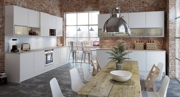 The exposed brick walls in this kitchen give it a decidedly industrial and unfinished feeling. However, the elements of the kitchen itself are clean and polished, from the gleaming stainless steel light fixture to the modern white chairs. The dining table is perfect for large meals and entertaining while the small bar overlooking the city makes for a cozy breakfast nook.