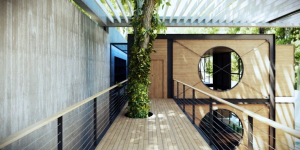 In this design, nature is once again not forgotten. An elevated walkway, made with wood planks, leaves space for trees to grow up and through it, giving shade to the house and offering a spectacular view of the grounds and surrounding areas.