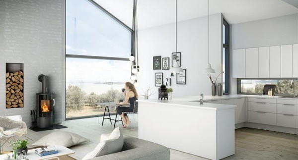 A wraparound counter creates the feeling of a separate room in this otherwise open home. The white on white color theme takes full advantage of the large sunny windows, making everything feel bright, airy, and open.