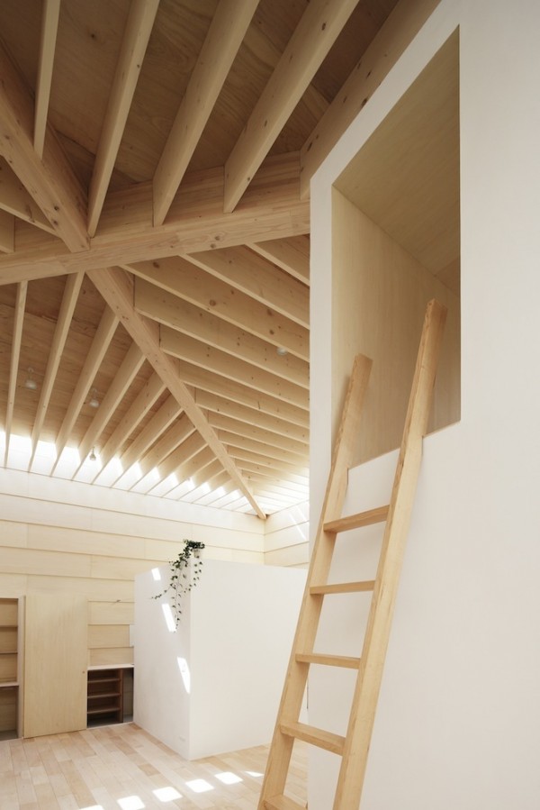 Sturdy ladders lead up to comfortable sleep, reading, or meditating nooks while the spaces below can be used as storage.