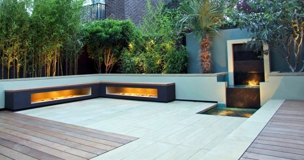 This built-in waterfall will create soothing sounds, whilst the glow from the lighting effects evokes a feeling of warmth whilst outdoors. Benches around the perimeter provide seating for contemplation.