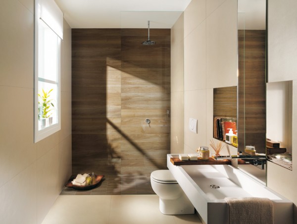 The warm looking brown backdrop in this shower gives a beautiful wood paneling effect.