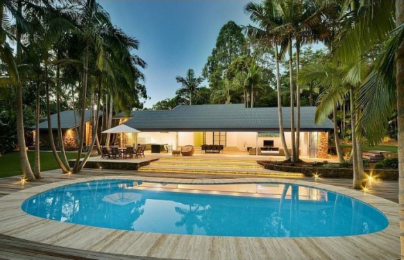 palm trees and pool house