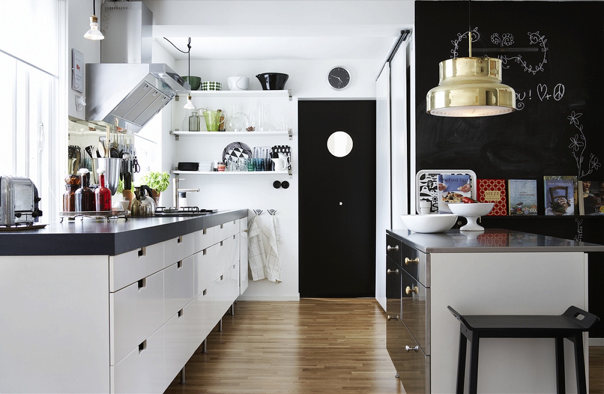 Modern stylish Scandinavian kitchen interior with kitchen accessories.  Stock Photo by puhimec