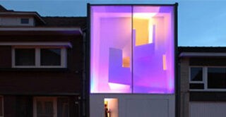 Glass Facade Reveals Architecturally Sculpted Home