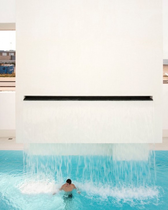 waterfall pool design Les Bains Des Docks Aquatic Center