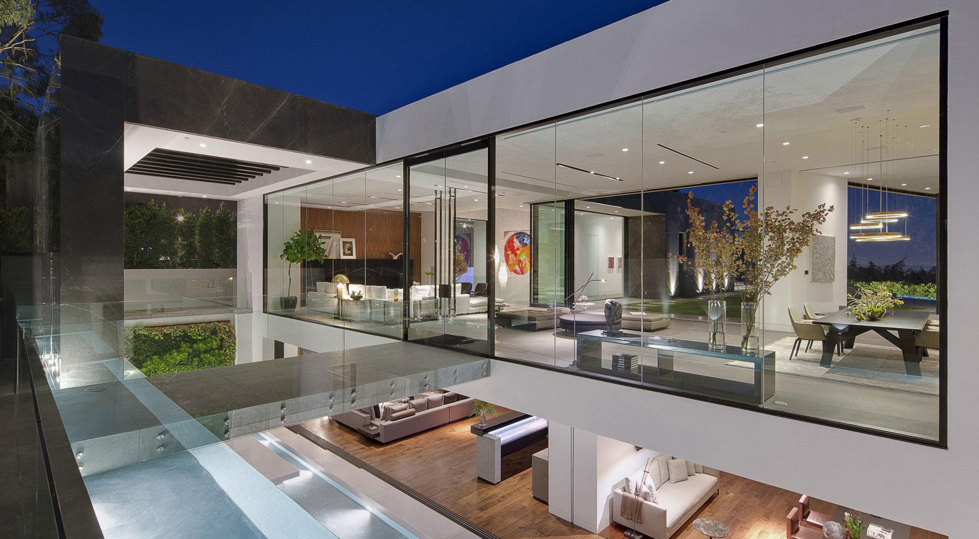 A Dramatic Glass Home Overlooking The L