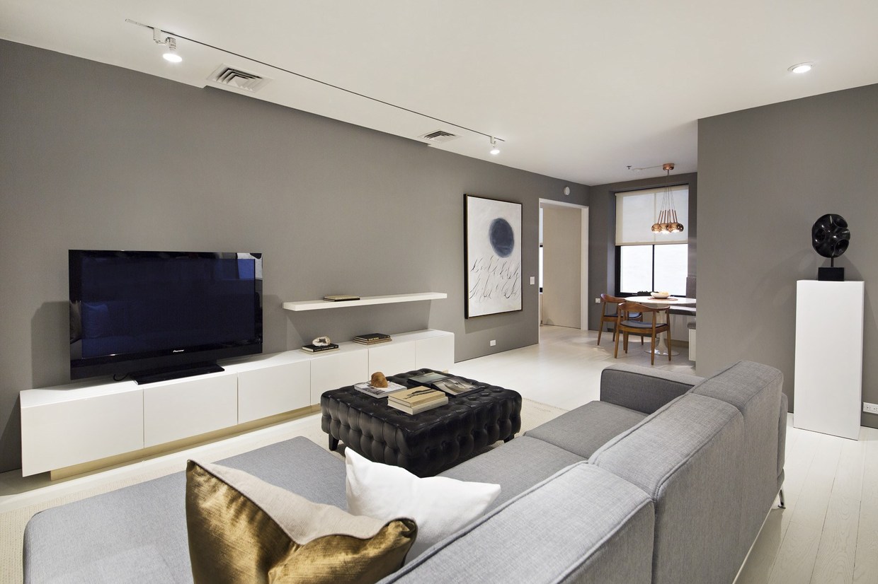 The media room remains simple but continues the trend of metallic accents. This layout is practical and feels laid back yet every detail stands out. 