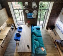 Cozy White and Wood Interior Divided by Glass Blocks