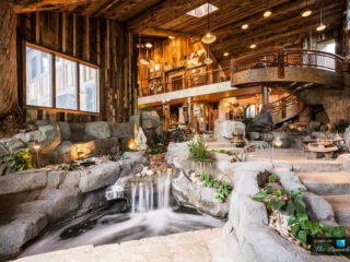 Rustic Mountaintop Mansion With Indoor River