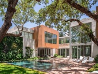 Shiny New Miami Mansion Under A Canopy Of Oak Trees