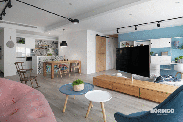 nesting coffee tables in bright and cheery apartment | Interior Design ...