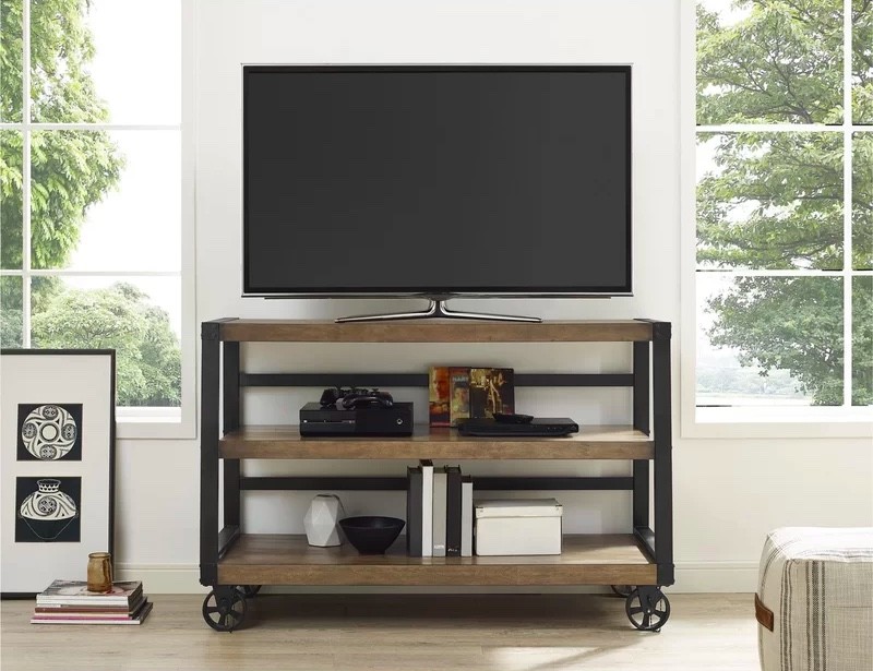 Industrial-style metal TV stand with wheels