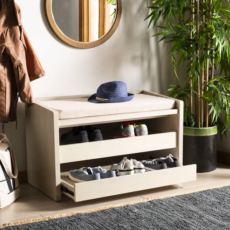 https://www.home-designing.com/wp-content/uploads/2019/10/Entryway-Bench-With-Slide-Out-Shoe-Drawers-And-Beige-Removable-Cushion.jpg