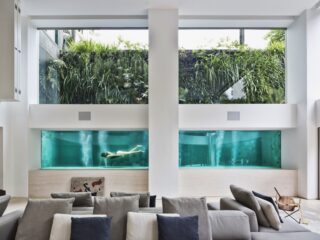 A Brazilian Art Collector’s Home With A Luxurious Glass Swimming Pool