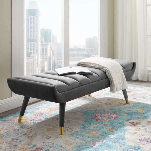 https://www.home-designing.com/wp-content/uploads/2020/04/modern-grey-end-of-bed-bench-shapely-seat-with-channel-tufting-and-splayed-legs-with-brass-caps-600x600.jpg