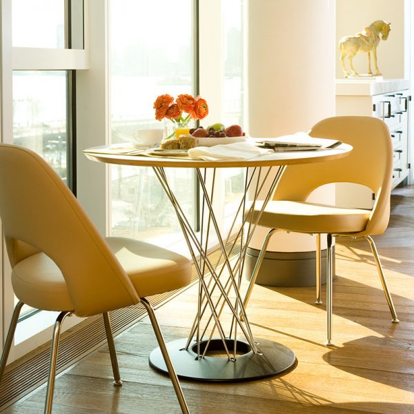 https://www.home-designing.com/wp-content/uploads/2020/06/Small-Sculptural-Dining-Table-with-Twisted-Silver-Base-and-Round-Top-600x600.jpg