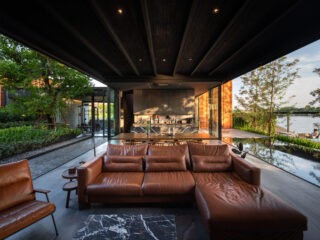 Amphitheater Style Lakeside Home with Sloping Courtyard Design