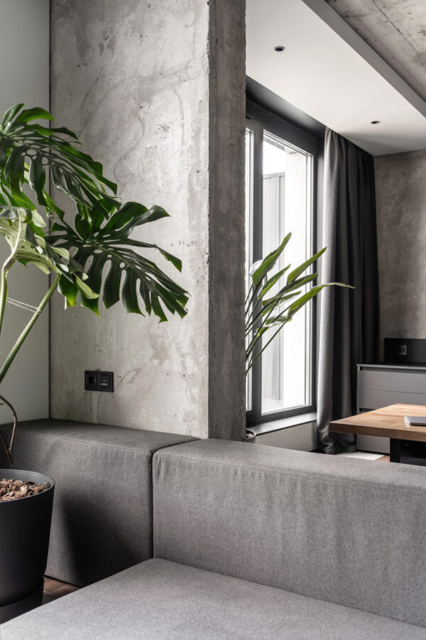 Concrete Monochrome Interiors That Incorporate Glass Wall Rooms