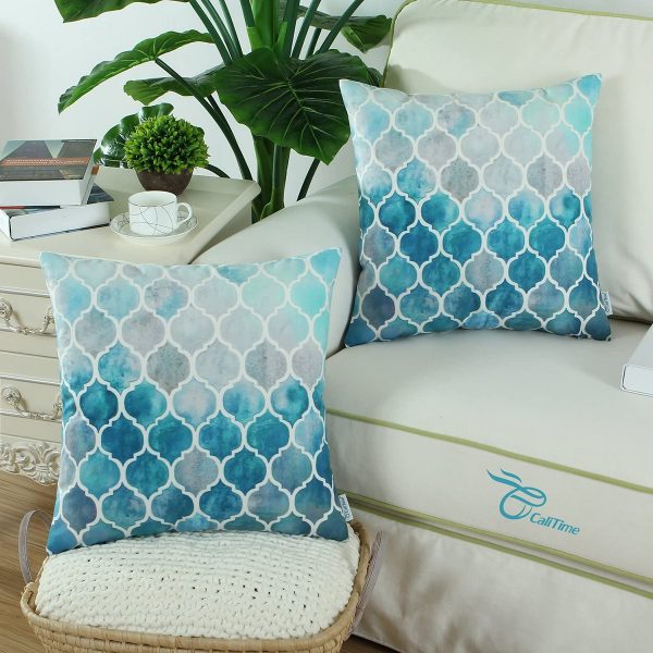 https://www.home-designing.com/wp-content/uploads/2020/09/Beach-Throw-Pillows-Blue-Watercolor-with-Quatrafoil-Pattern-600x600.jpg