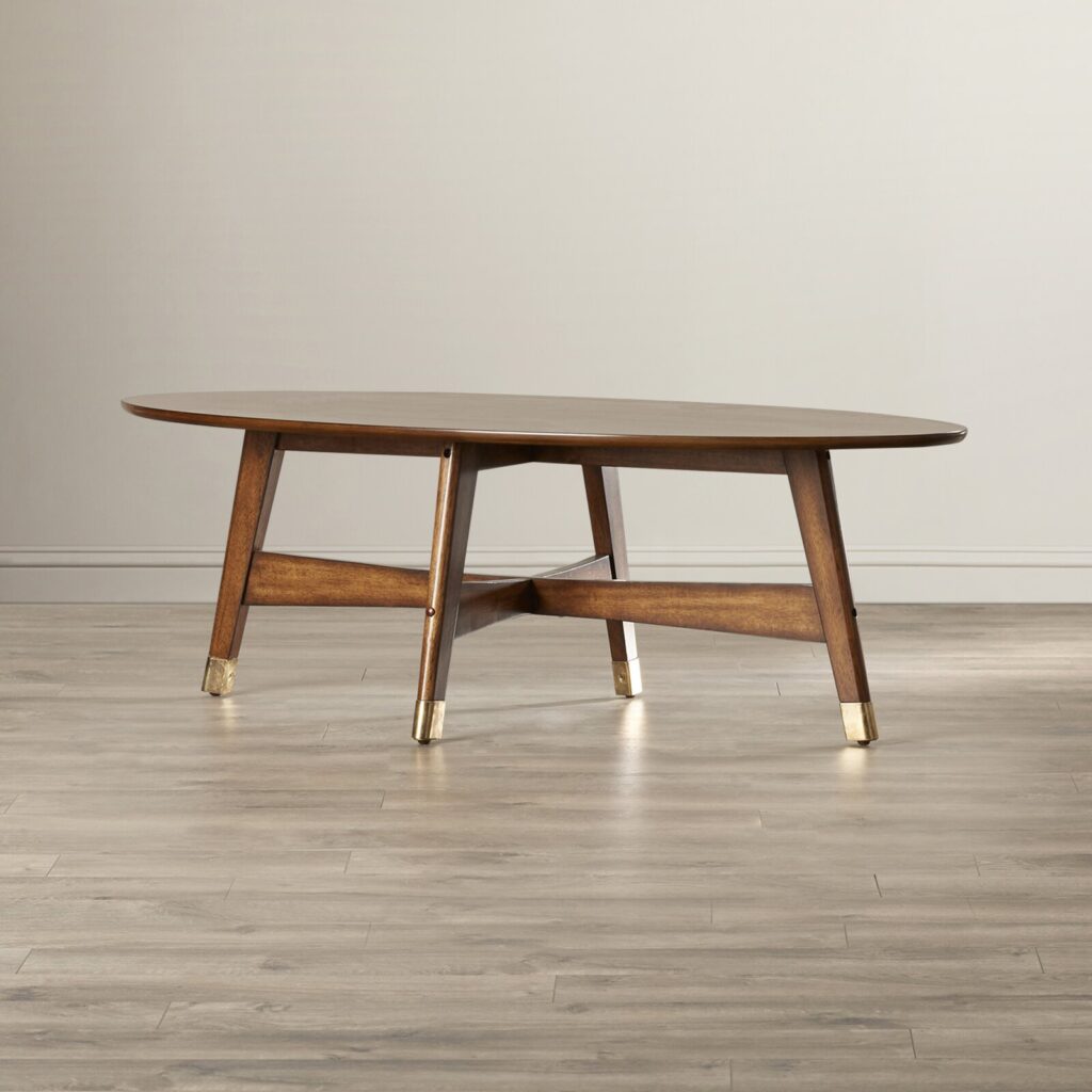 mid century oval coffee table warm wood finish with brass capped legs ...