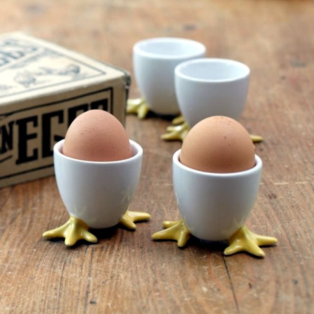 https://www.home-designing.com/wp-content/uploads/2021/05/ceramic-egg-cup-with-chicken-feet-design-cute-creative-housewarming-gift-idea-kitchen-gadgets-fun-breakfast-ideas-for-kids.jpg