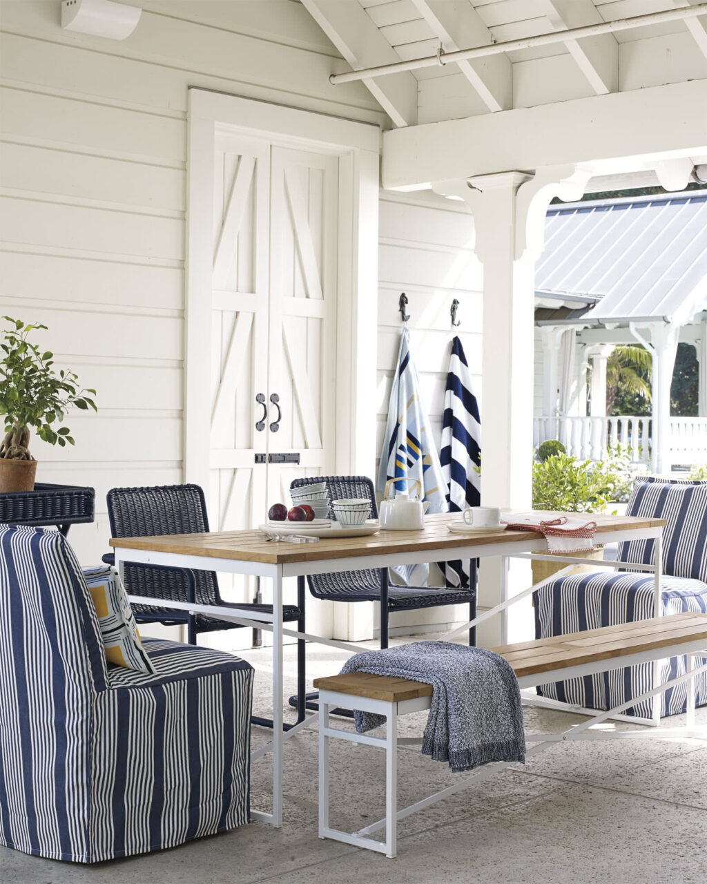 highend outdoor dining bench for coastal beach house covered patio