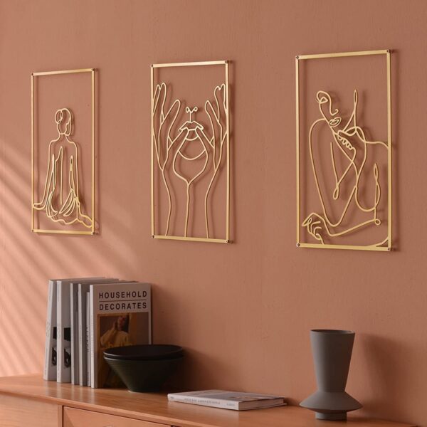 https://www.home-designing.com/wp-content/uploads/2022/04/wall-art-decor-for-living-room-gold-figure-drawings-in-gold-minimalistic-laser-cut-metal-artwork-to-hang-above-sofa-console-on-mantle-creative-livingroom-foyer-accents-600x600.jpg