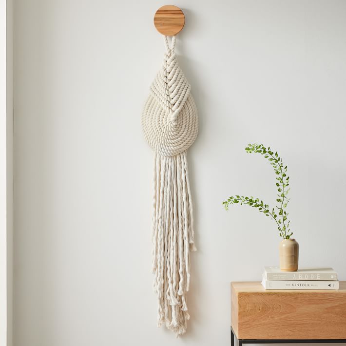 boho macrame wall hanging small tear-drop shaped woven cotton rope decor  for bedroom entryway living room decoration ideas for narrow walls corners  bedside above side table