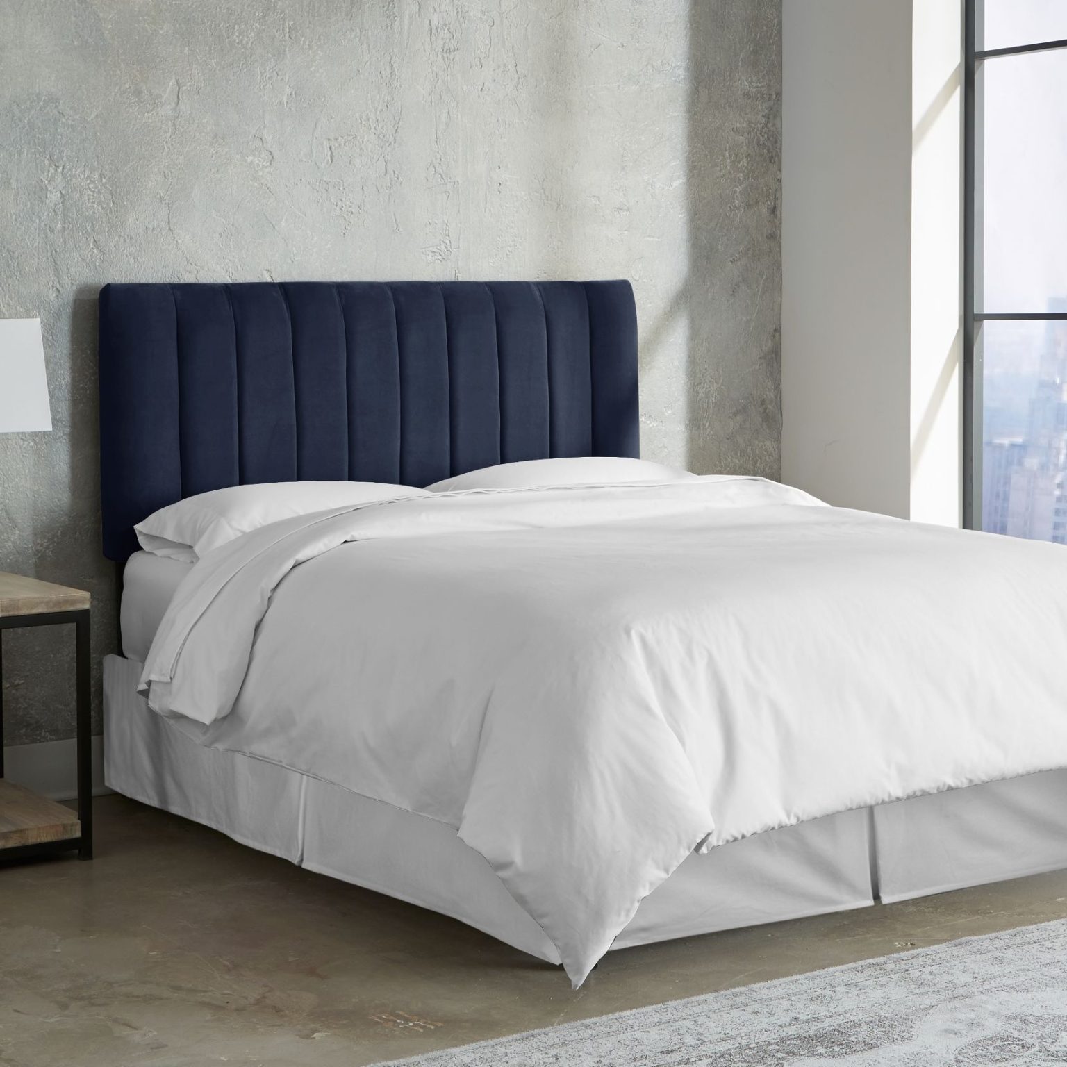 dark blue full size upholstered headboard with vertical channel tufting