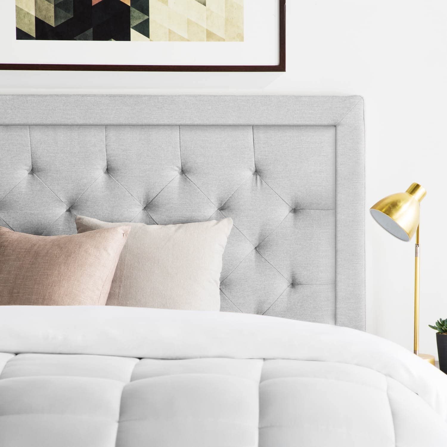 minimalist white upholstered headboard with diamond tufting and thick ...