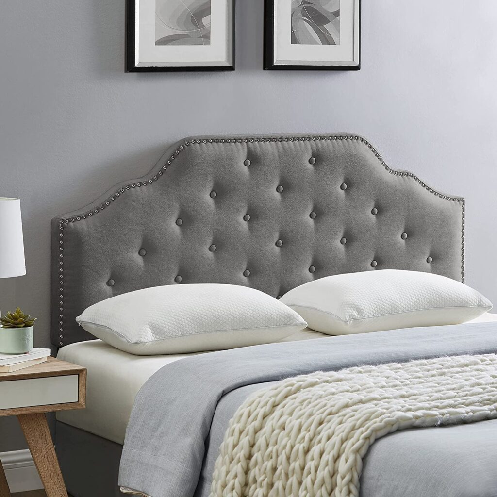 shapely traditional upholstered headboard with button tufting and