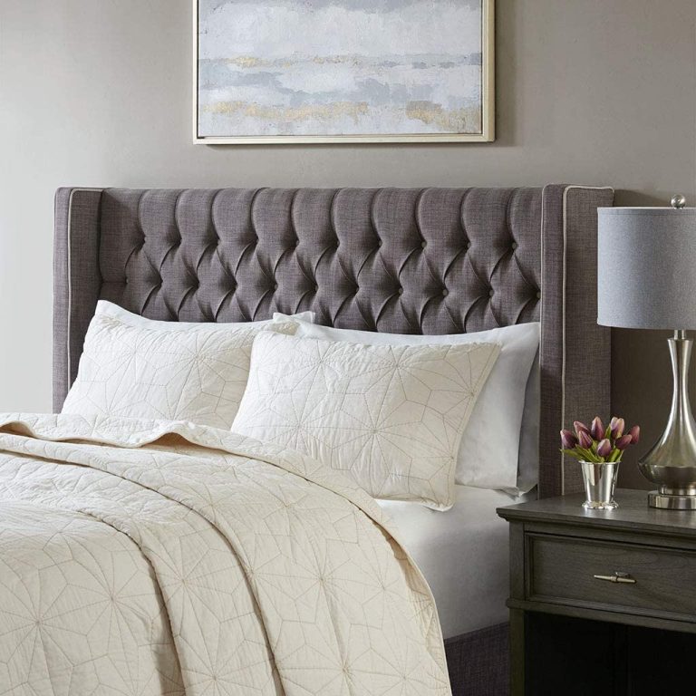stylish dark grey upholstered wingback headboard with contrast piping diamond tufted wellpadded