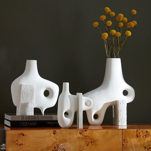 designer modern ceramic vase design available for sale online smooth matte white exterior textural sculptural decorative accents for living room shelf tables creative gifts